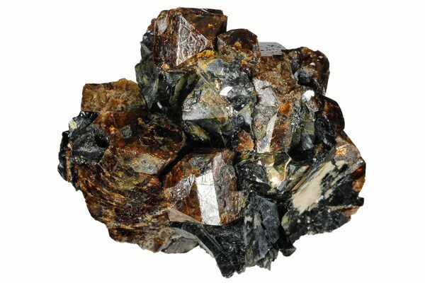 Fluorescent zircon crystals in a biotite schist from Norway.